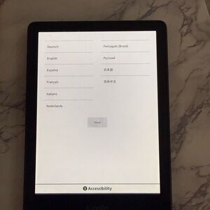 Kindle Paperwhite and 2 casss